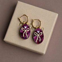 Load image into Gallery viewer, Oval Bow Charm Hoop Earring