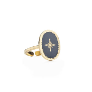 Gold oval adjustable statement ring with midnight blue disc with star motif from lovely day jewellery